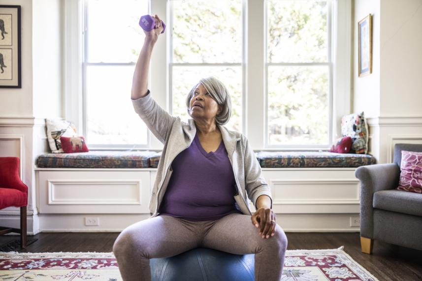 Older woman lifting weights