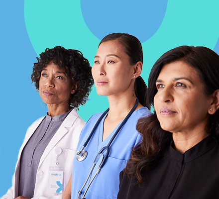 A team of 3 medical professionals standing in a row, ready to help.