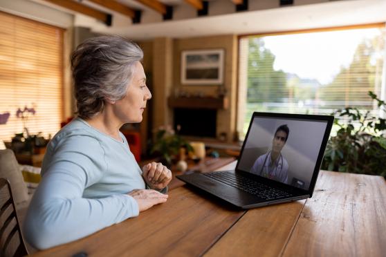 senior woman having a telehealth visit for a story on Matrix telehealth visits 